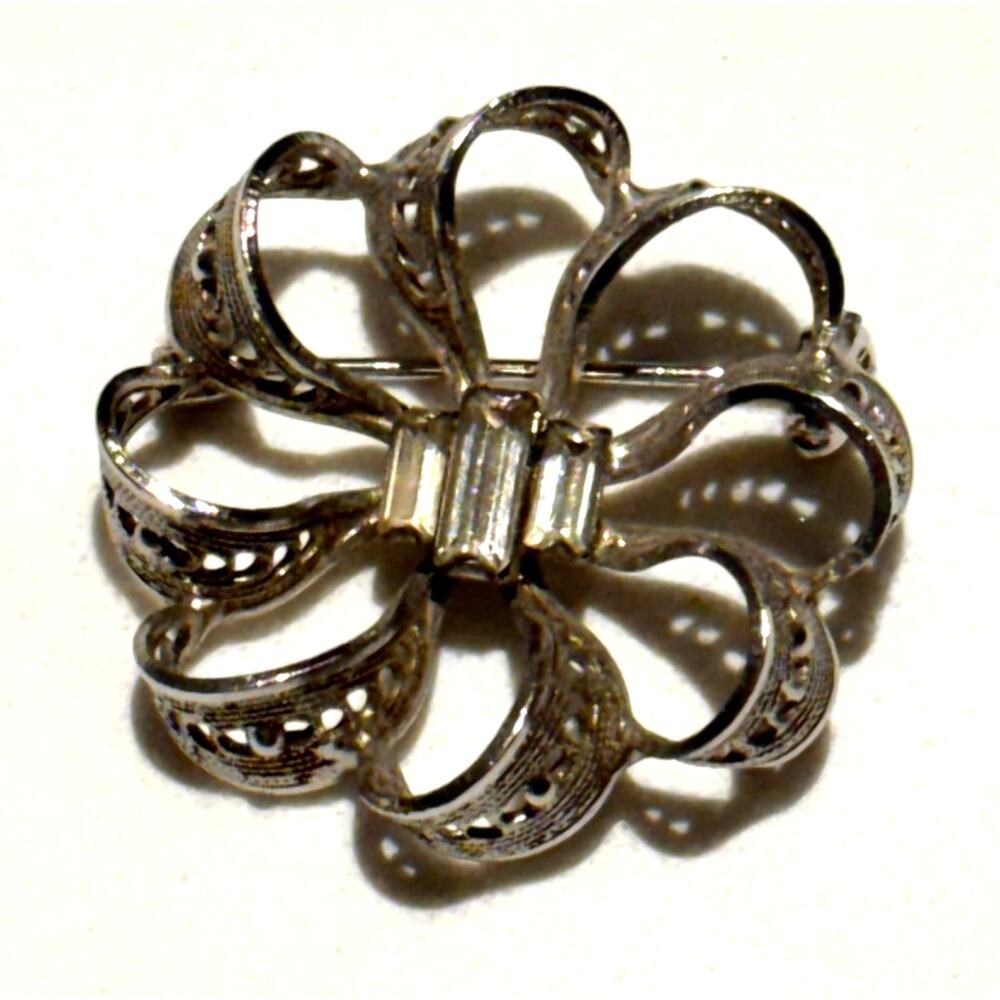 Continental silver & rhinestone brooch filigree round dimensional signed pin
